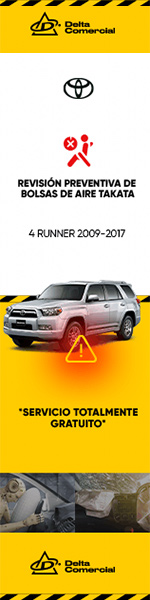 a man with headphones on sitting in front of a camera